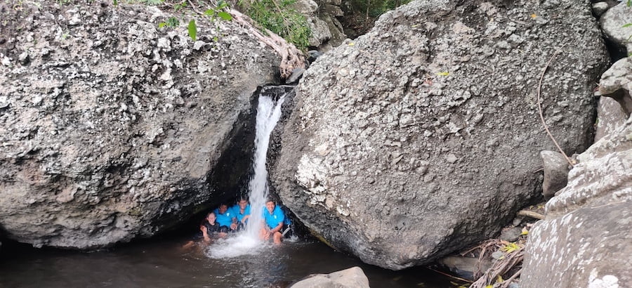 Women guides cooling off on the hike